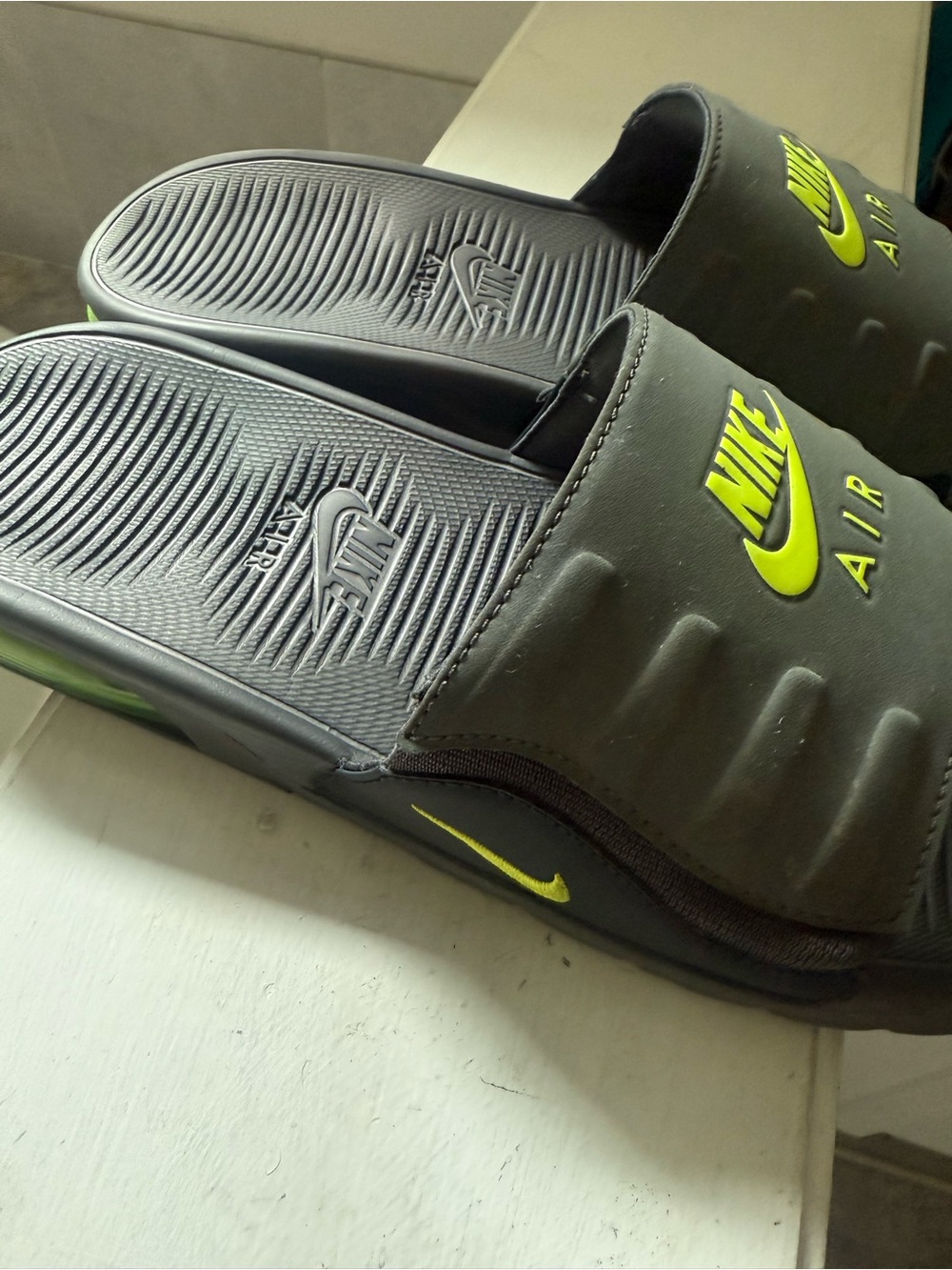 Nike Black Slide Sandals with Neon Yellow Accents